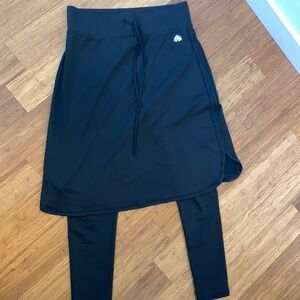 Courtney Toliver Black Snoga size Medium full length leggings shirt tail hem